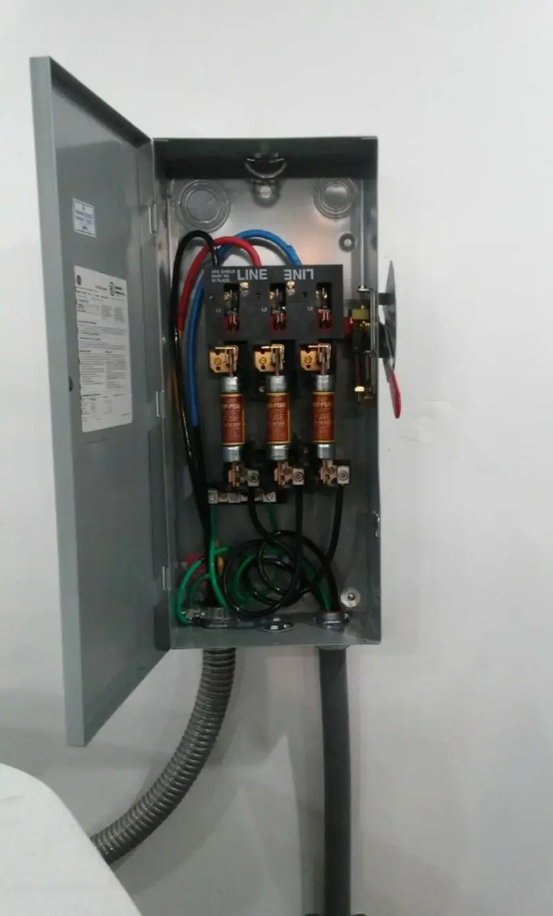 Three-phase disconnect switch installed for Smoke Detector Installation in Tysons